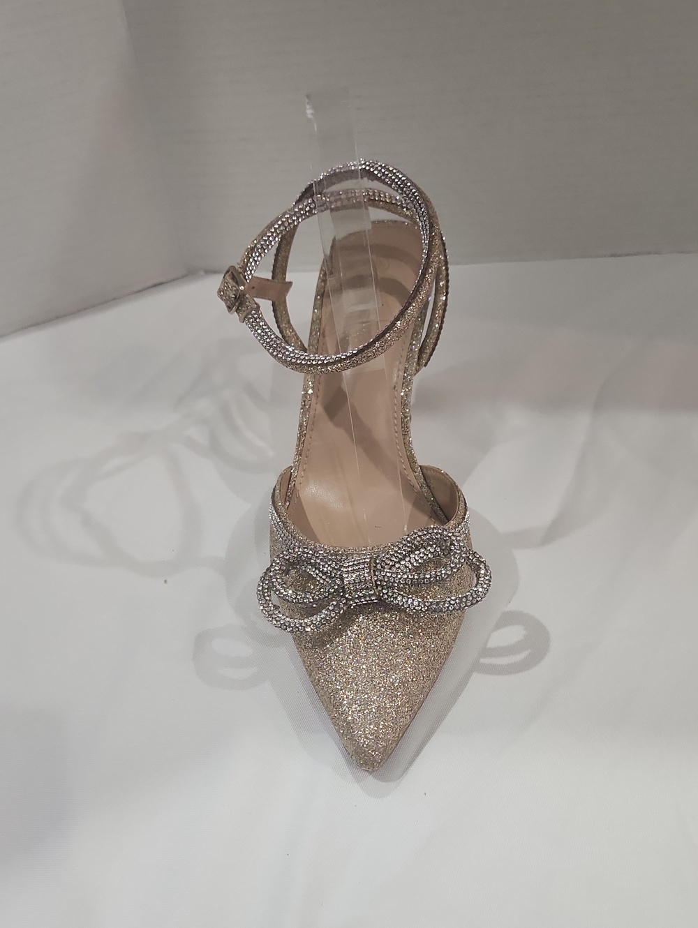 Crystal Bow Ankle-Strap Pointed Toe Pump in Gold